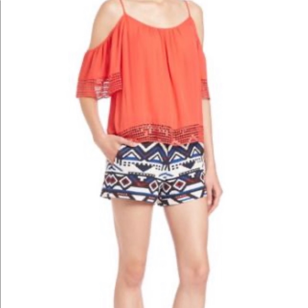 Parker cold shoulder salmon pink top.
